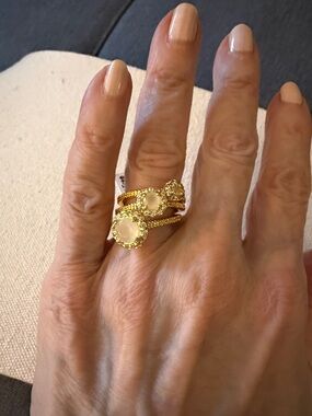 NWT Gold Tone Stacking Rings (3) with round cabochons in a Halo Setting. Size 7.